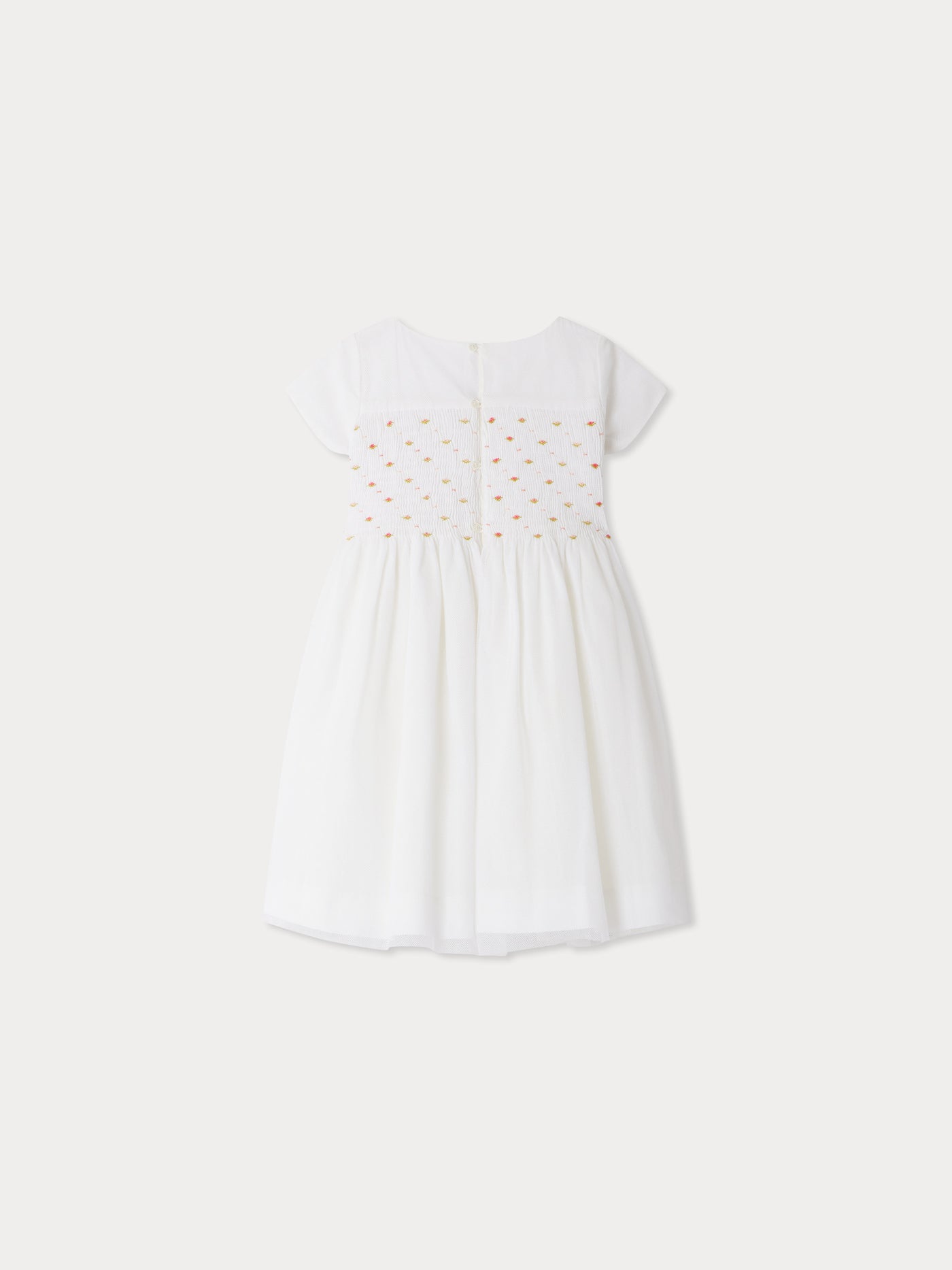 Duchesse dress in smocked and re-embroidered tulle