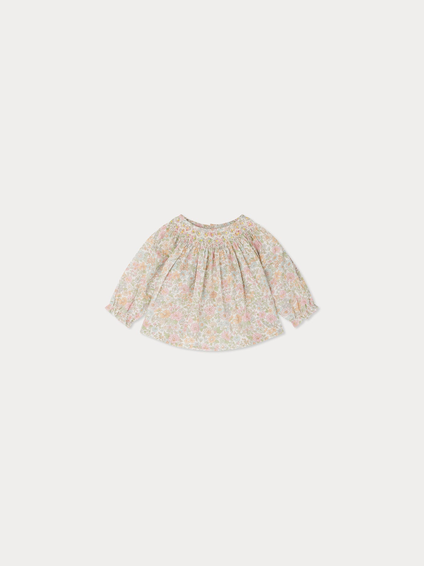 Griotte smocked blouse made with green Liberty fabrics